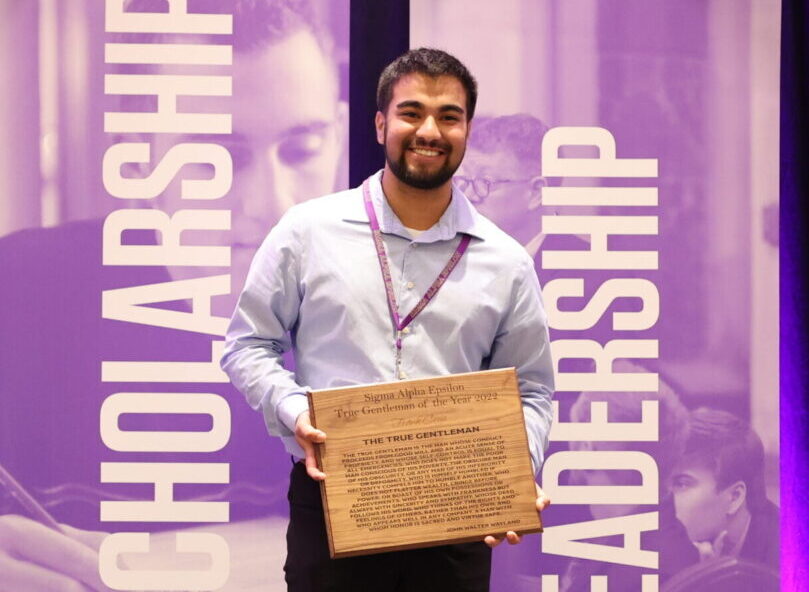 SAE brother receiving recognition at leadership event