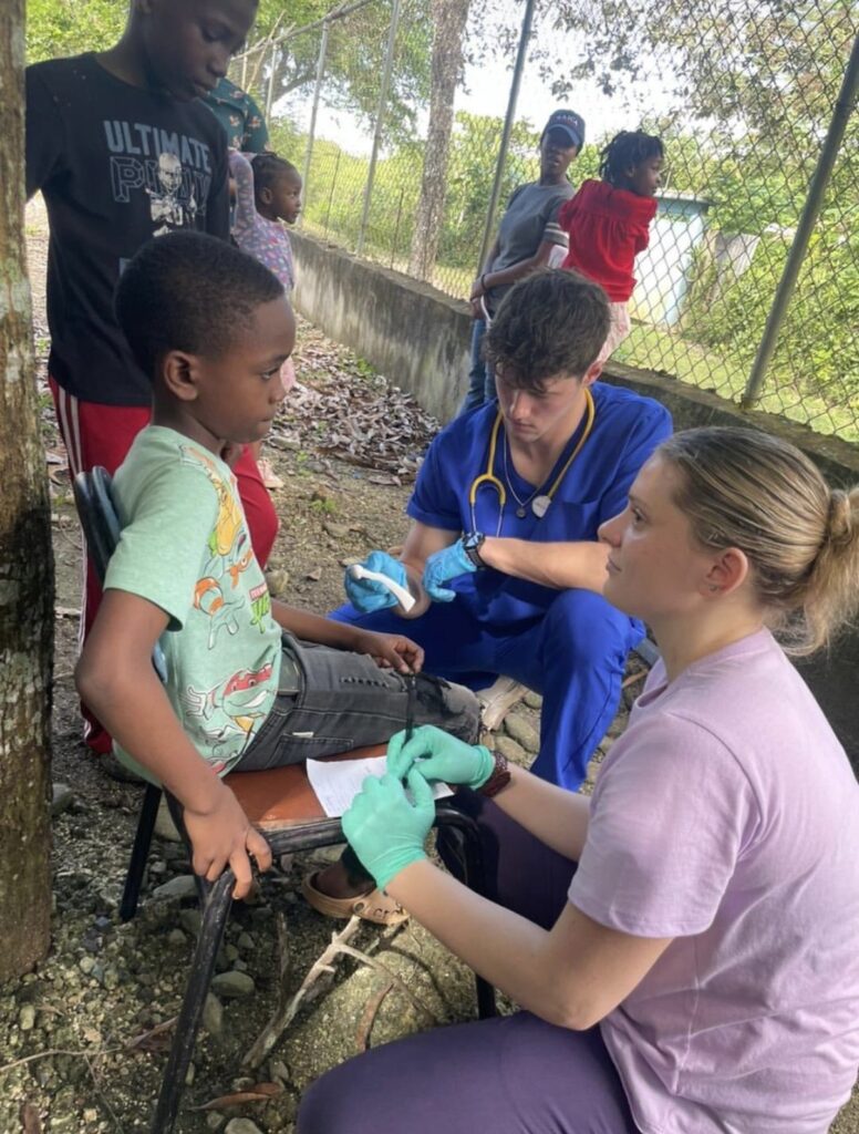 Tending to a 12-year-old boy who had a foot infection
