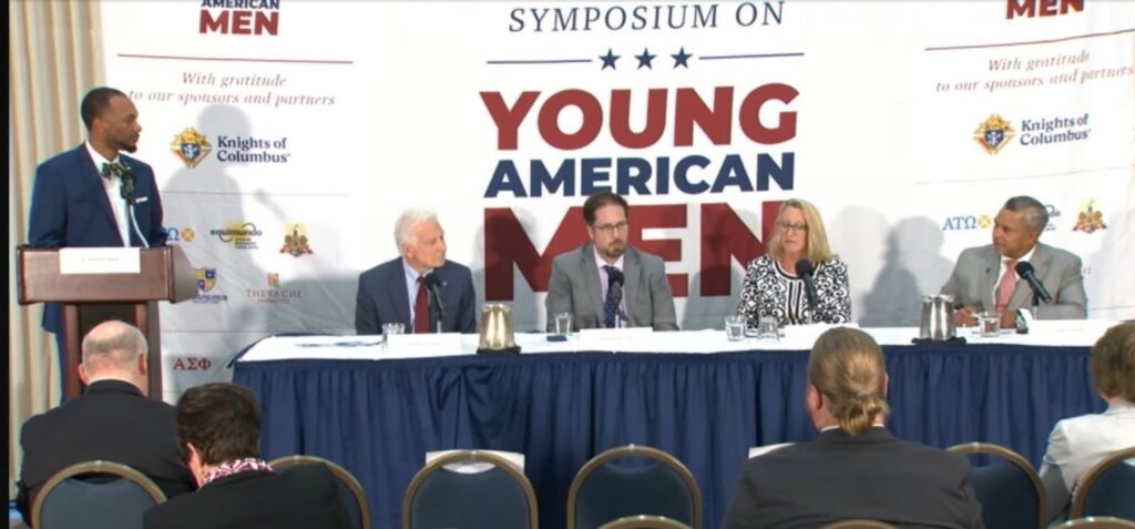 Dr. Anthony Mack moderating panel discussion