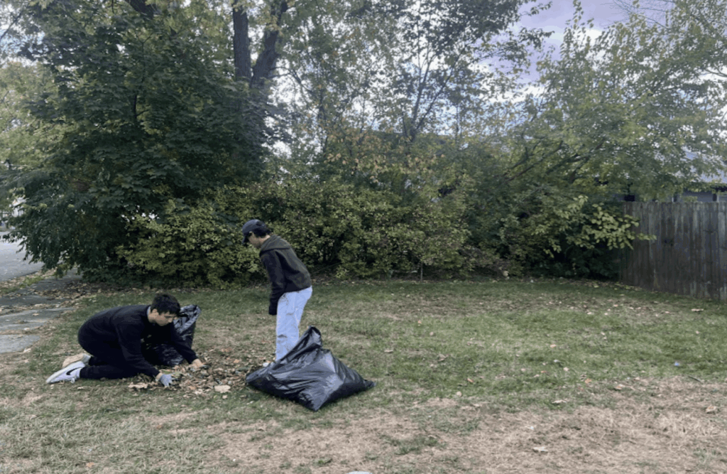 Ball State SAEs volunterring by raking leaves