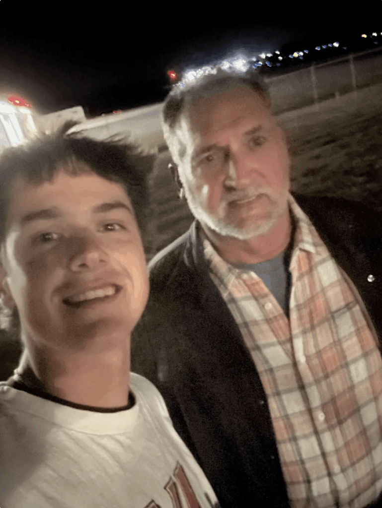 SAE student pictured with Virginia Tech football coach, James Franklin