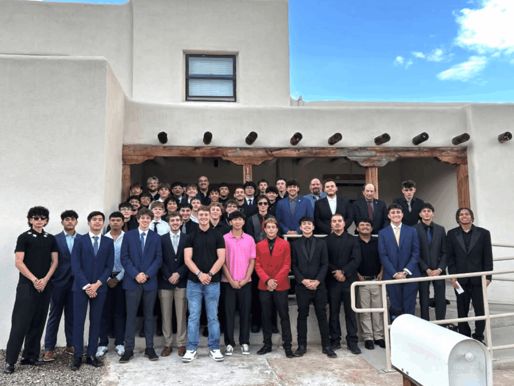 group photo of SAE brothers at New Mexico chapter house