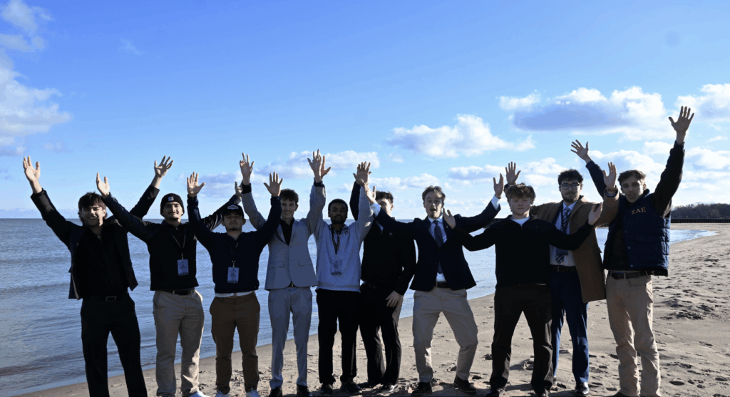 group photo of SAE brothers at the beach