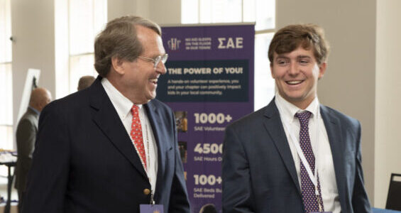 two generations of SAE brothers volunteering together