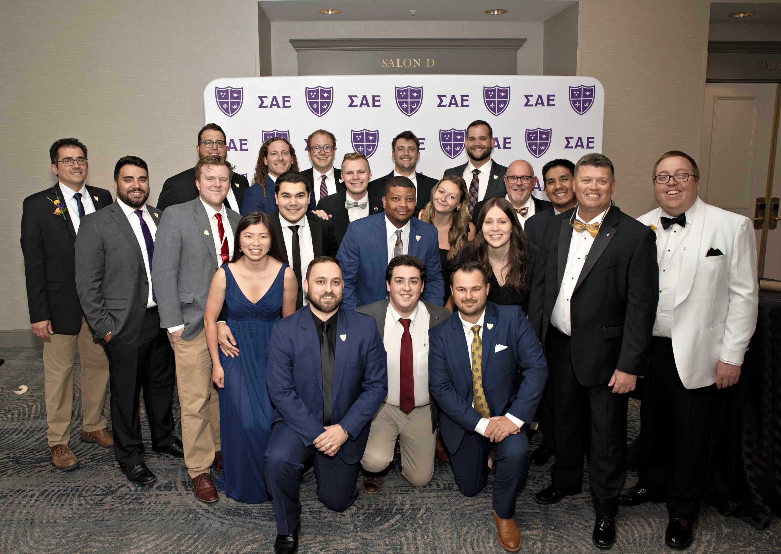 group photo of SAE brothers and their significant others